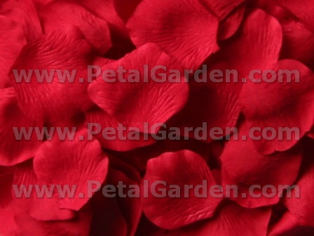 Red silk rose petals